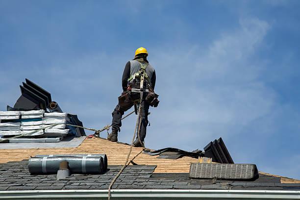 Professional Roofing technician working in Oswego, KS